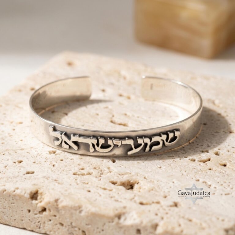 Personalized sterling silver cuff bracelet engraved with a Hebrew verse and name
